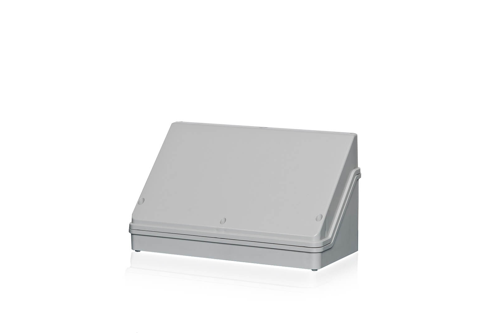 Eine Polycarbonat-Anschlussbox mit Deckel hinter einem transparenten Hintergrund